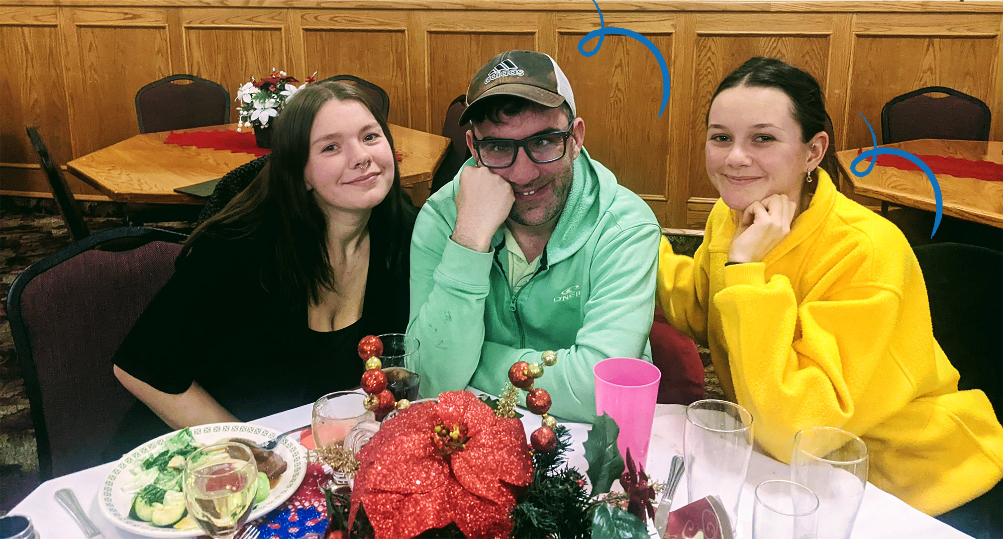 Three large members at a coffee shop during Christmas